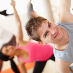 mp63657185-portrait-smile-and-stretching-man-in-yoga-class-for (1)